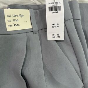 Brand new pleated pants. On trend 25 long